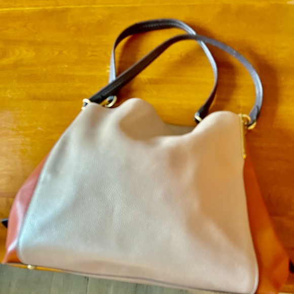 Barely used Tri~Color Coach Purse lots of pockets and zippers!